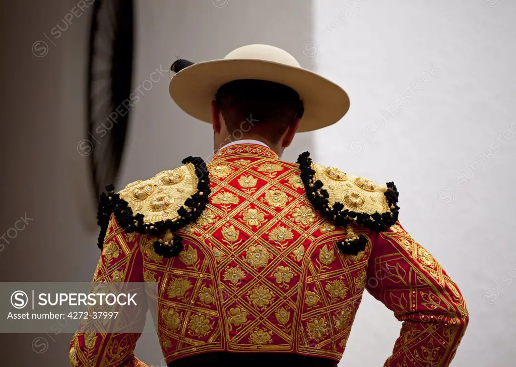 Spain, Andalusia, Seville; A 'picador' in an elegant traditional costume just before his entrance to the arena for a bull-fight
