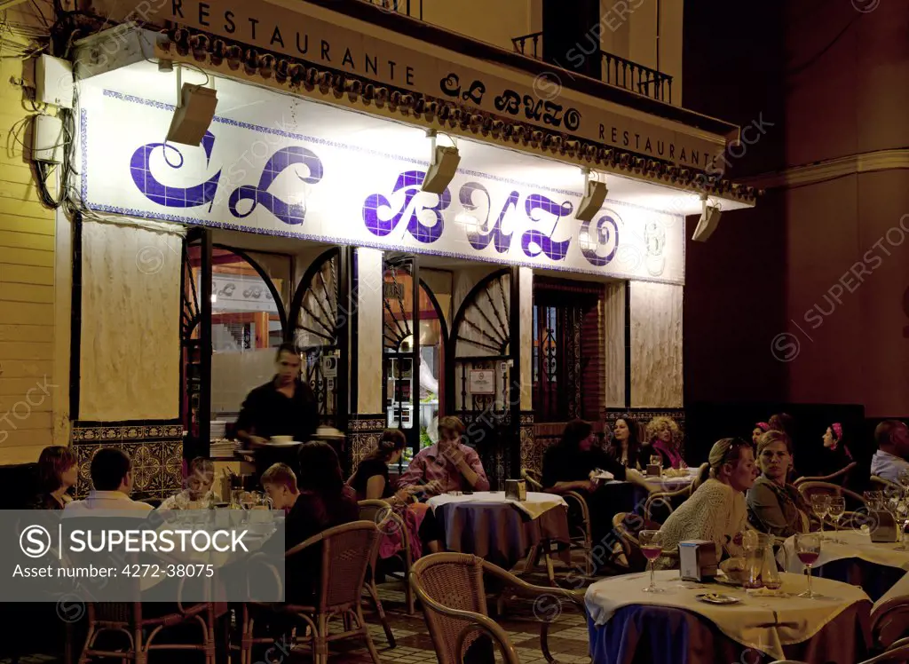 Spain, Andalusia, Seville; Outside a typical restaurant at night