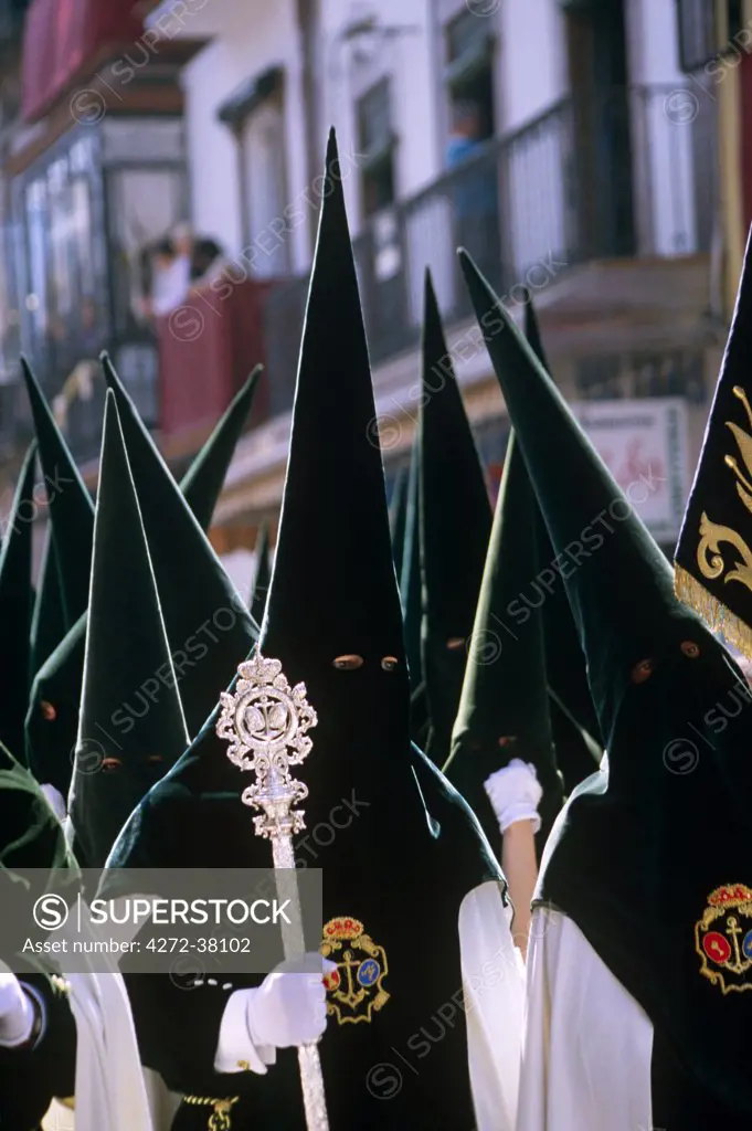 Spain, Andalusia, Seville. Nazarenos during Semana Santa processions