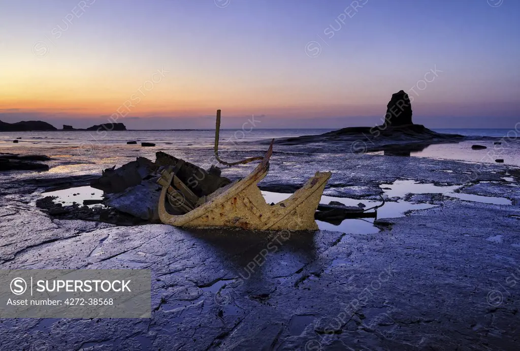 Europe, England, North Yorkshire, Whitby, Saltwick Bay at low tide.