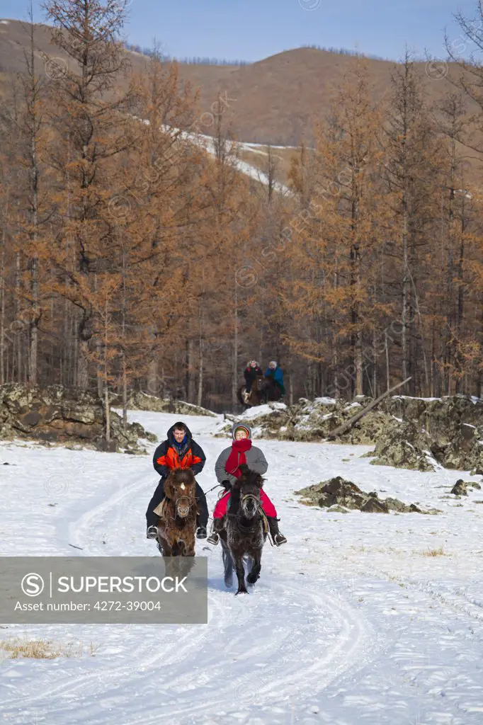 Mongolia, Ovorkhangai, Orkhon Valley. Tourists on horseback.