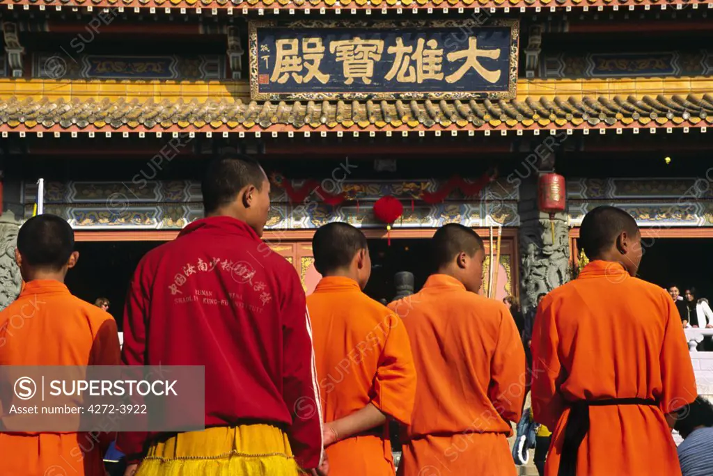 Monks from the Shaolin Kung Fu Institute perform at the Po Lin Monastery on Lantau Island, Hong Kong.