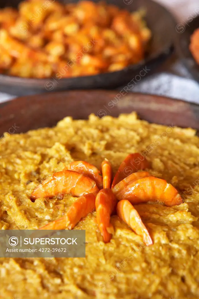 Brazil, Food, a bowl of vatapa with king prawns, a typical dish from Bahia made with bread, shrimp, coconut milk, peanuts and palm oil