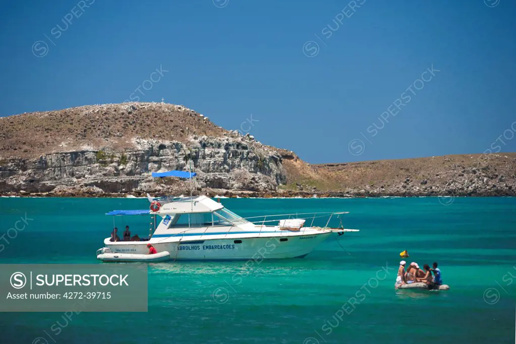 South America, Brazil, Bahia, Abrolhos, dive boat on turquoise coral sea in the Abrolhos Islands National Marine Park