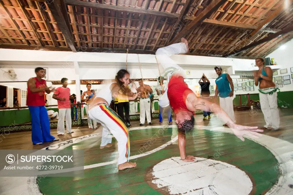 South America, Brazil, Bahia, Arraial dAjuda, members of the Mestre Railson capoeira group playing capoeira