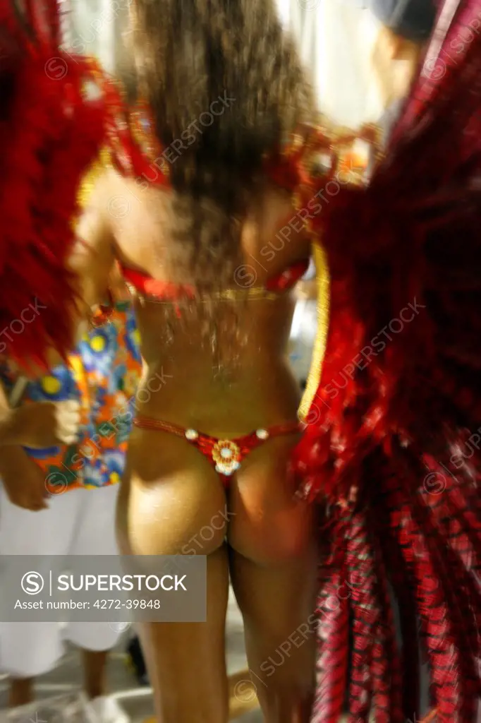 South America, Rio de Janeiro, Rio de Janeiro city, costumed dancer showing buttocks at carnival in the Sambadrome Marques de Sapucai