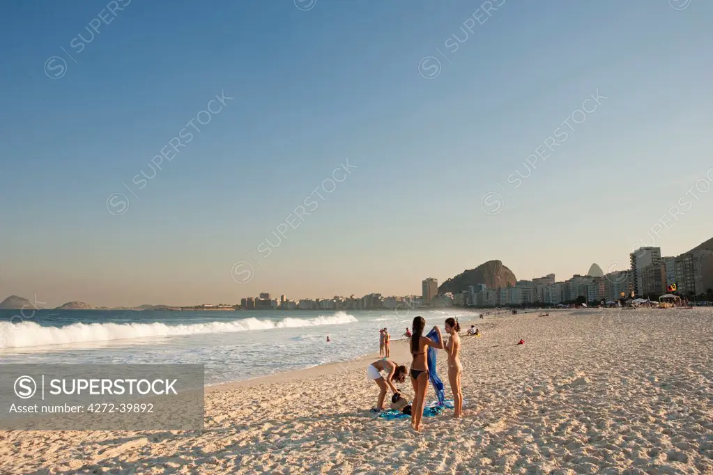 South America, Rio de Janeiro, Rio de Janeiro city, girls in bikinis on Copacabana Beach
