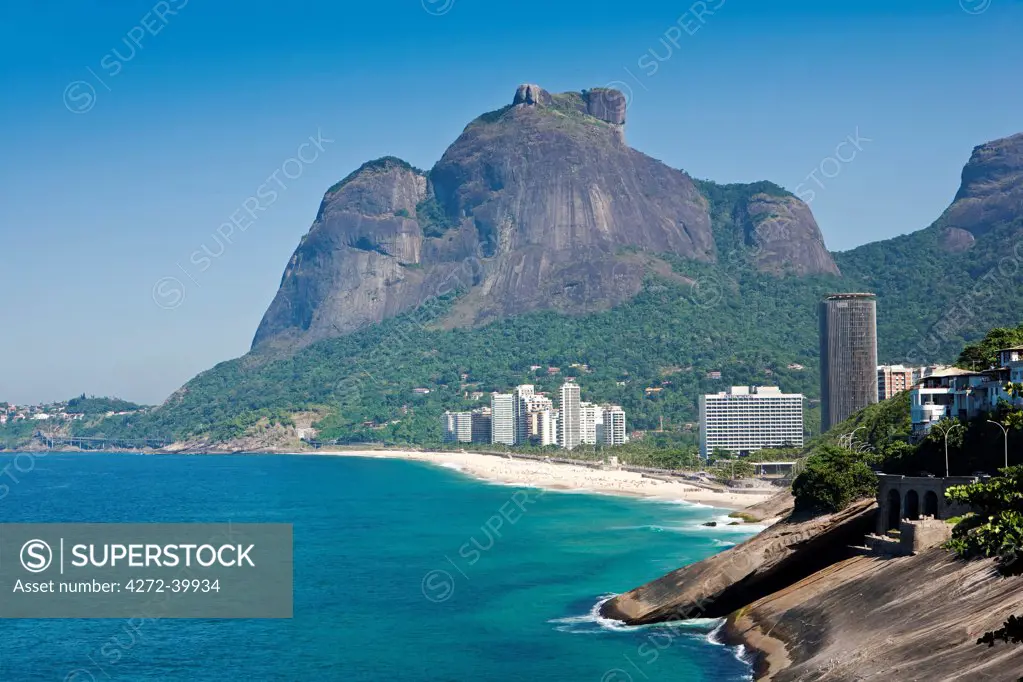 Brazil, Rio de Janeiro state, Rio de Janeiro city, the Pedra da Gavea with Sao Conrado beach and the Intercontinental hotel in the foreground and in Tijuca National Park behind