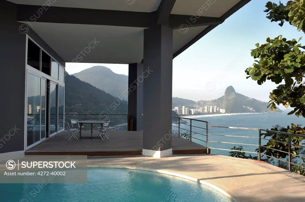 Brazil, Rio de Janeiro city, Gavea, La Suite Hotel, view of the pool with Sao Conrado and the Dois Irmaos mountains behind PR