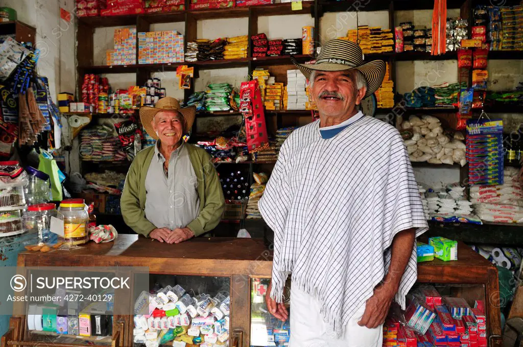 Two men in a country store in Inza, Colombia, South America