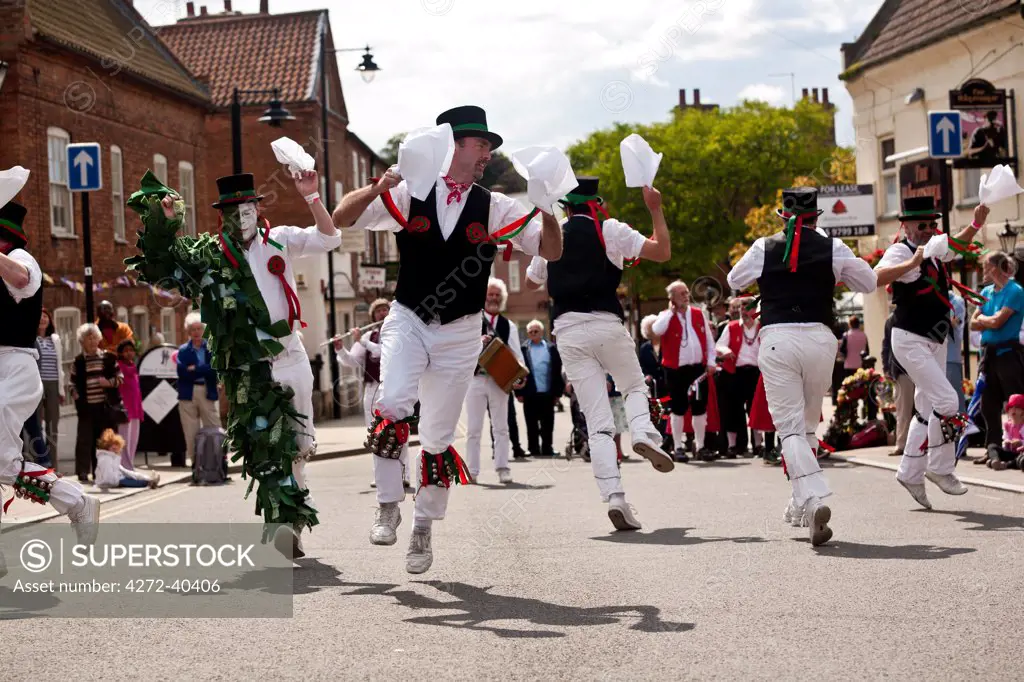 Southwell, England. A traditional Morris side dances in the street as part of the Southwell gate Morris festival.