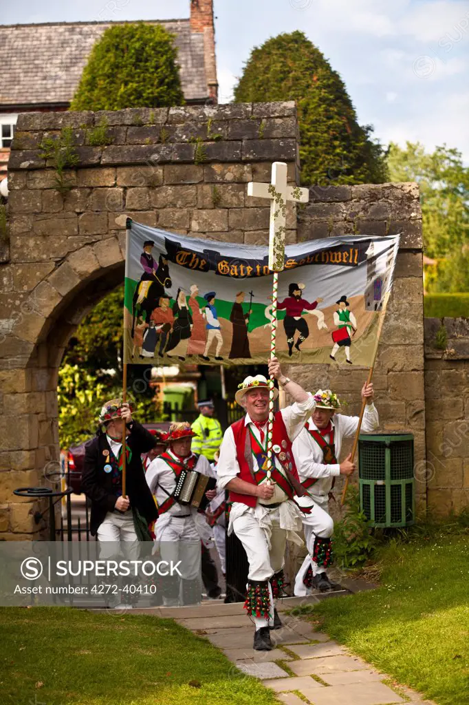 Southwell, England. The traditional march of the Southwell pence by Morris dancers as part of the Southwell gate Morris festival.