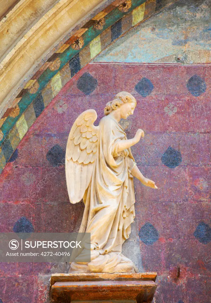 France, Provence, Avignon, Angel sculpture at church entrance