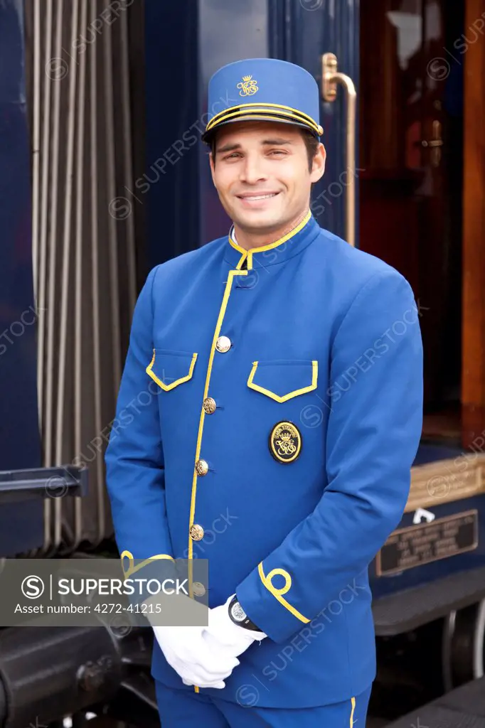 A steward in his very smart uniform on the Venice Simplon Orient Express train, Innsbruck, Austria