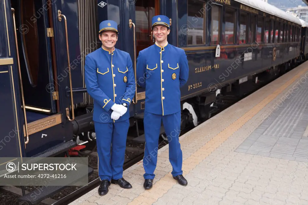 Stewards on the Venice Simplon Orient Express train, having a short stop at Innsbruck, Austria