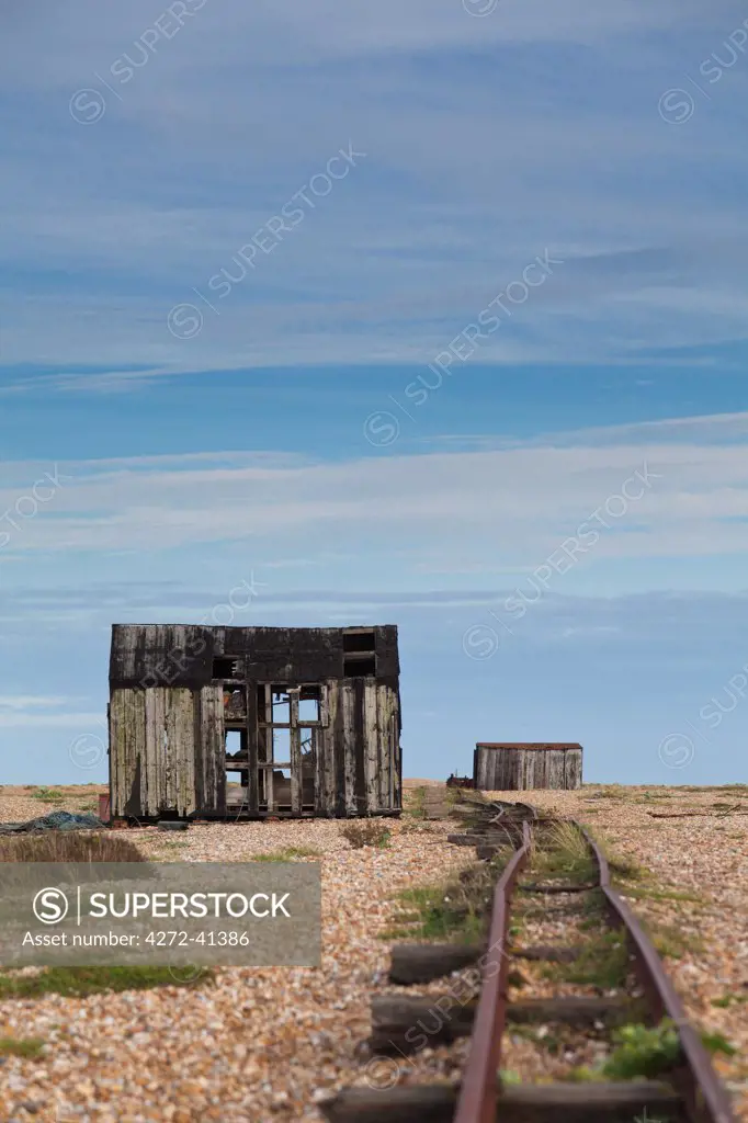 England, Kent, Dungeness. Abandoned railway track on Dungeness beach.