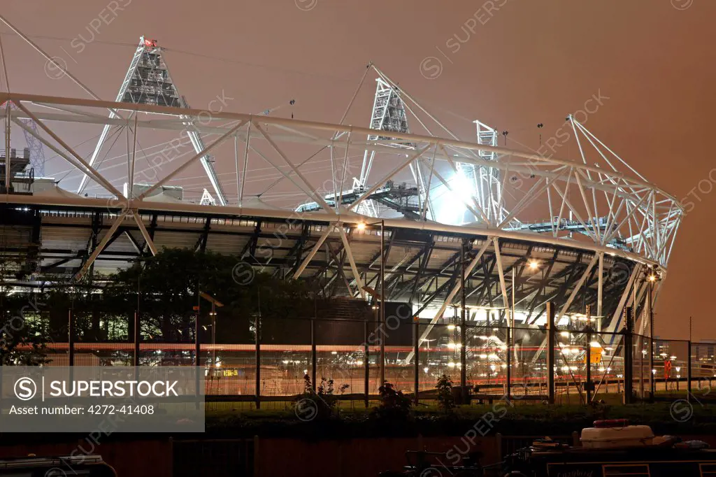 The Olympic Stadium in London seen from the East with the River Lea in the foreground.