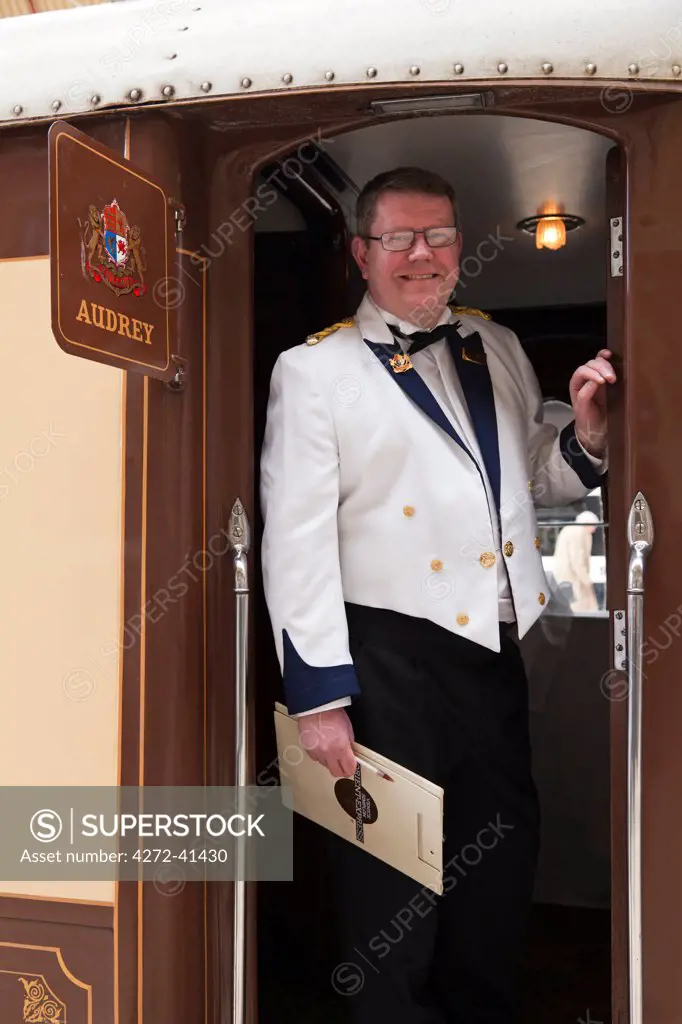 A steward on the British Pullman train, heading for Folkestone, England