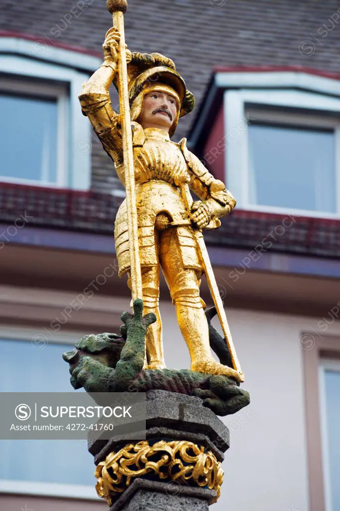 Europe, Germany, Freiburg, Baden Wurttemberg, statue of St George and the dragon in Munster Platz Cathedral Square