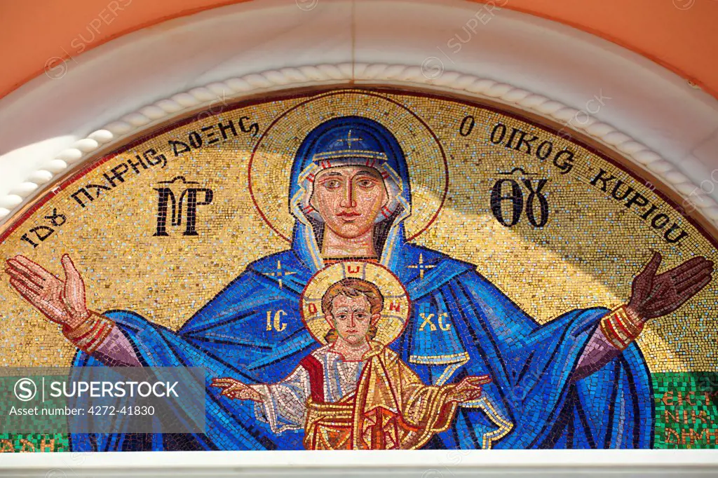 Greece, Kos, Southern Europe. Detail of icon with Madonna and Child on top of a church