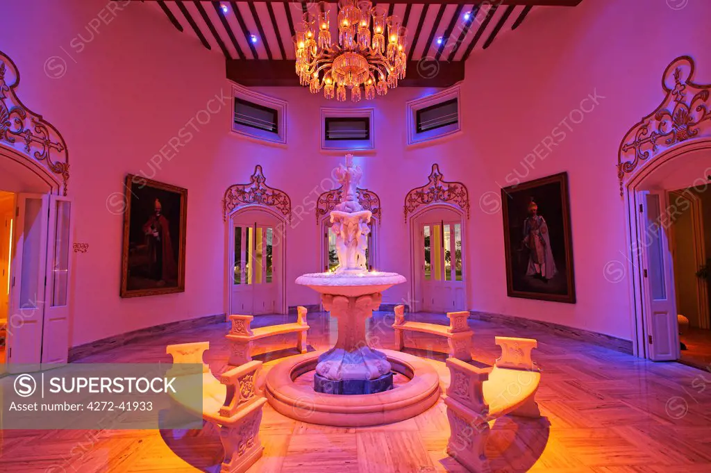 India, Andhra Pradesh, Hyderabad. A lobby alongside the main restaurants at the luxury Falaknuma Palace Hotel.