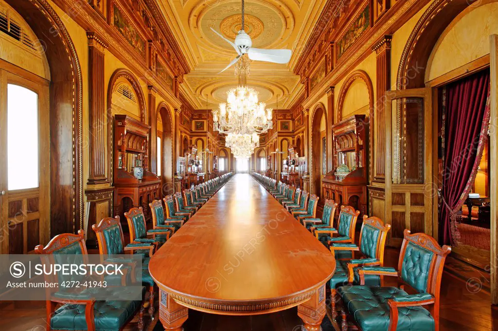 India, Andhra Pradesh, Hyderabad. The Dining Room, which seats 101 guests, at the Falaknuma Palace Hotel.