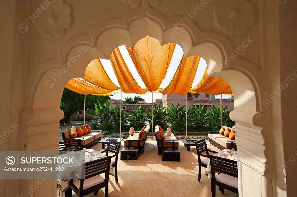India, Rajasthan, Nagaur. The informal al fresco dining terrace of Ranvas, a luxury hotel occupying part of Ahichhatragarh Fort.