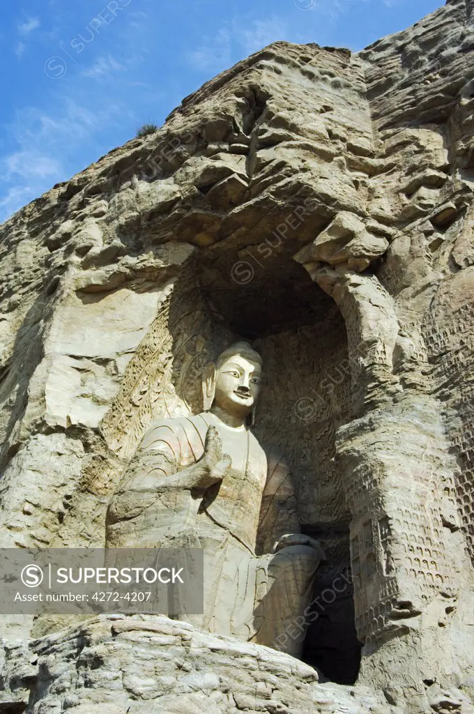 China, Shanxi Province, Datong. Buddhist Statues of Yungang Caves cut during the Northern Wei Dynasty (460 AD). Unesco World Heritage site near Datong.