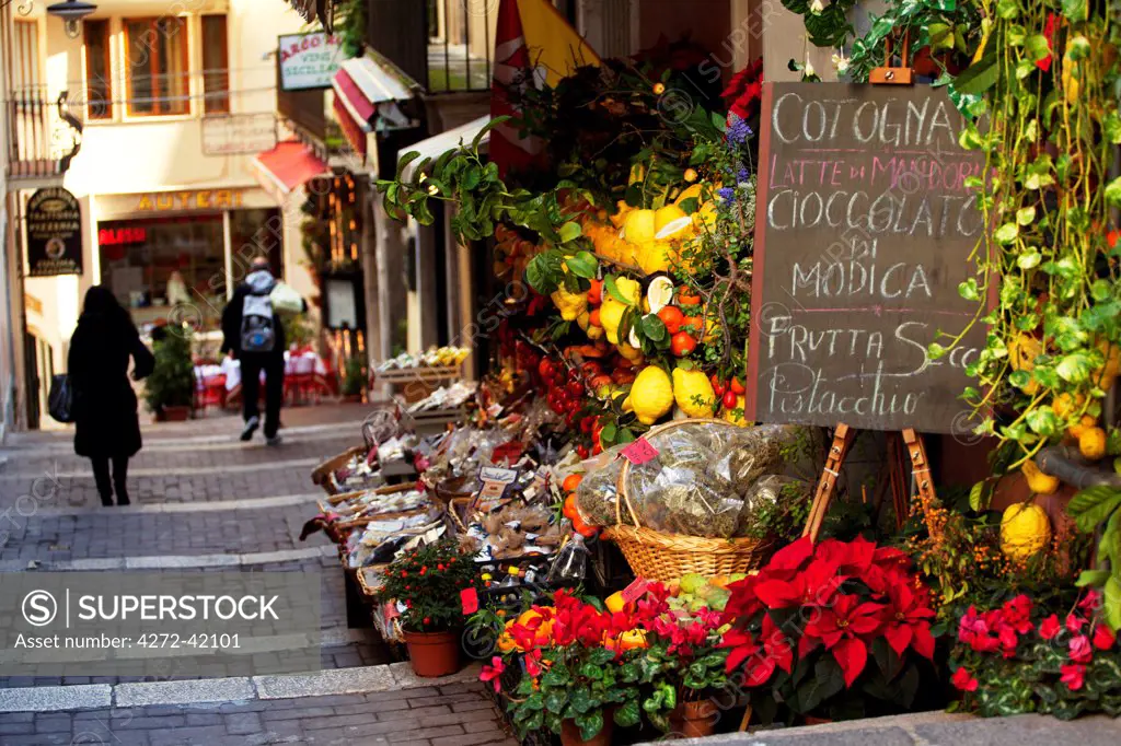 Taormina, Sicily, Italy, Shop sign with products for sale in a typical street.