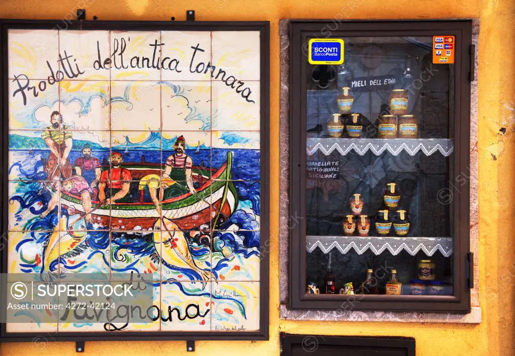 Taormina, Sicily, Italy, Painted tiles advertising the Tonnara of Favignana and tuna products coming from there