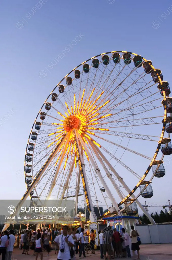 China, Shandong Province, Qingdao City. Amusement park's big wheel at the Qingdao International Beer Festival. Qingdao is the host of the sailing events of the 2008 Olympic Games.