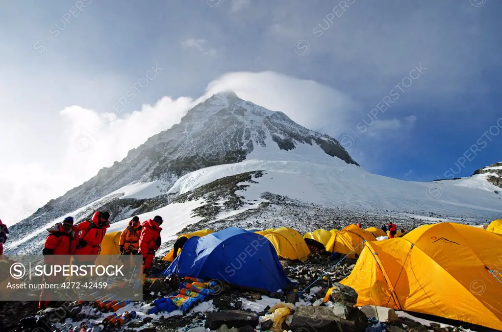 Asia, Nepal, Himalayas, Sagarmatha National Park, Solu Khumbu Everest Region, Sherpa checking oxygen at the South Col, 8000m, Mt Everest South Summit above