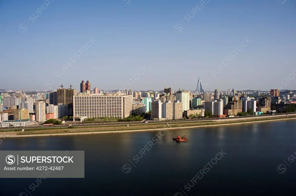 North Korea, Pyongyang. The Taedong river and Pyongyang skyline