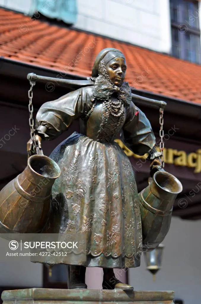 Poland, Europe, Poznan, Bamberg Woman statue, historic old town