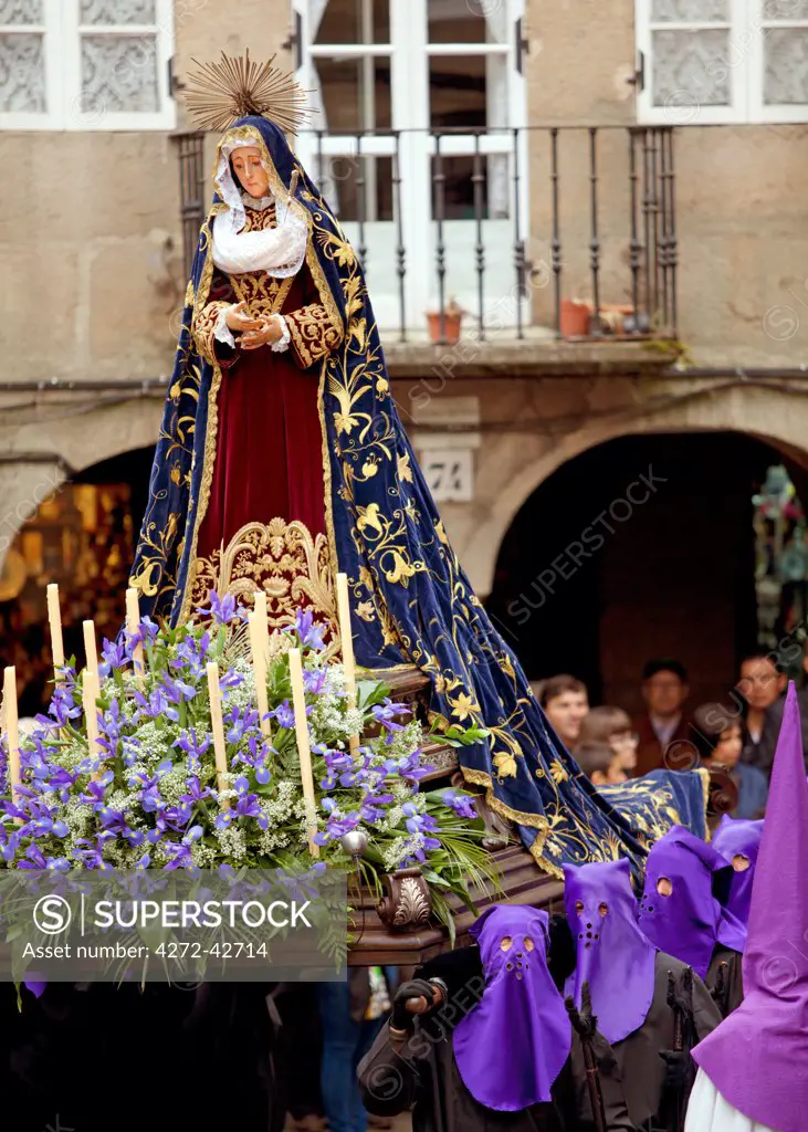 Santiago de Compostela, Galicia, Northern Spain, Nazarenos carrying statue during Semana Santa processions