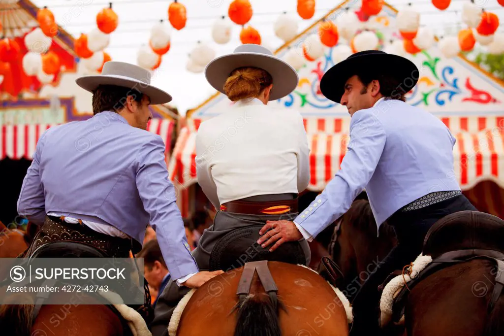 Seville, Andalusia, Spain, Horse riders during the Feria de Abril