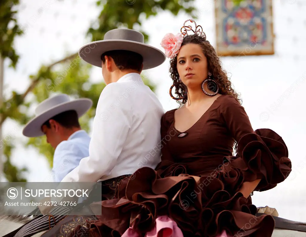 Seville, Andalusia, Spain, Young couple at the Feria de Abril