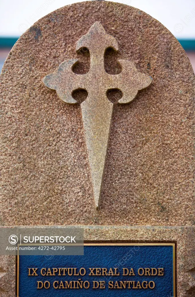 Spain, Galicia, Camino Frances, A stone with the symbol of the Santiago Cross on the camino