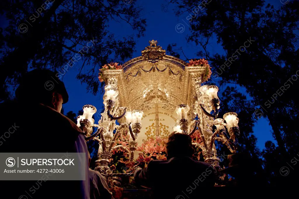 Seville, Andalusia, Spain. The Sin Peccado or Icon of the Madonna accompanied by pilgrims on their way to the village of El Rocio during the El Rocio pilgrimage