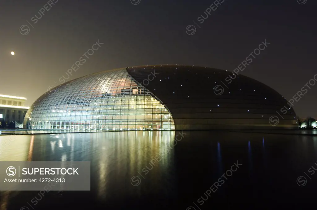 China Beijing The National Grand Theatre Opera House and full moon also known as The Egg designed by French architect Paul Andreu and made with glass and titanium opened Sept 25th 2007