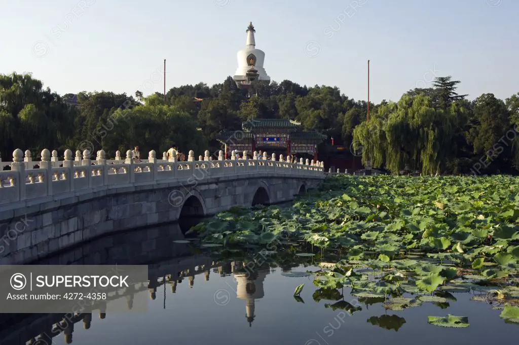 China, Beijing, Beihai Park. Baitai White Dagoba on Jade Islet originally built in 1651 for a visit by the Dalai Lama.