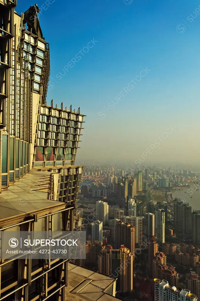 View of downtown Shangahi from above, from the observation level of the Jin Mao Tower designed by the architect Adrian Smith of Skidmore owings and Merrill, SOM,, Pudong, Shanghai, China.