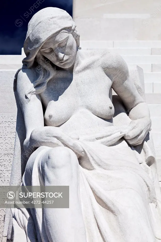 A sculpture of a young woman, Mourning Parent, on the western steps of the reverse side of the Canadian National Vimy Memorial, Givenchy en Gohelle, Nord Pas de Calais, France.