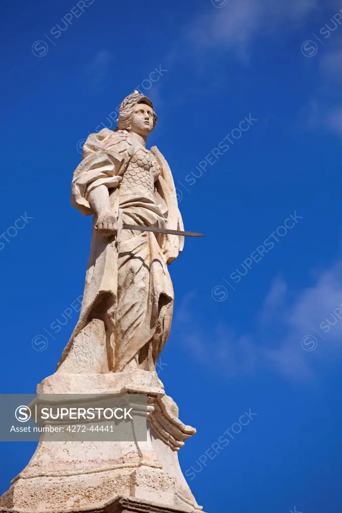 Mediterranean Europe, Malta. Statue of a saint in the main square of Vittoriosa