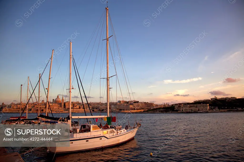 Mediterranean Europe, Malta. Yachts parked in a harbour in Tigne with Valletta in the background