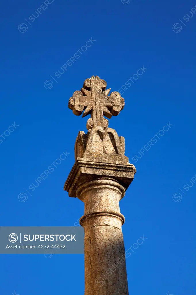 Mediterranean Europe, Maltese Islands, Gozo. Detail of a stone cross dating back to Medieval times in a square