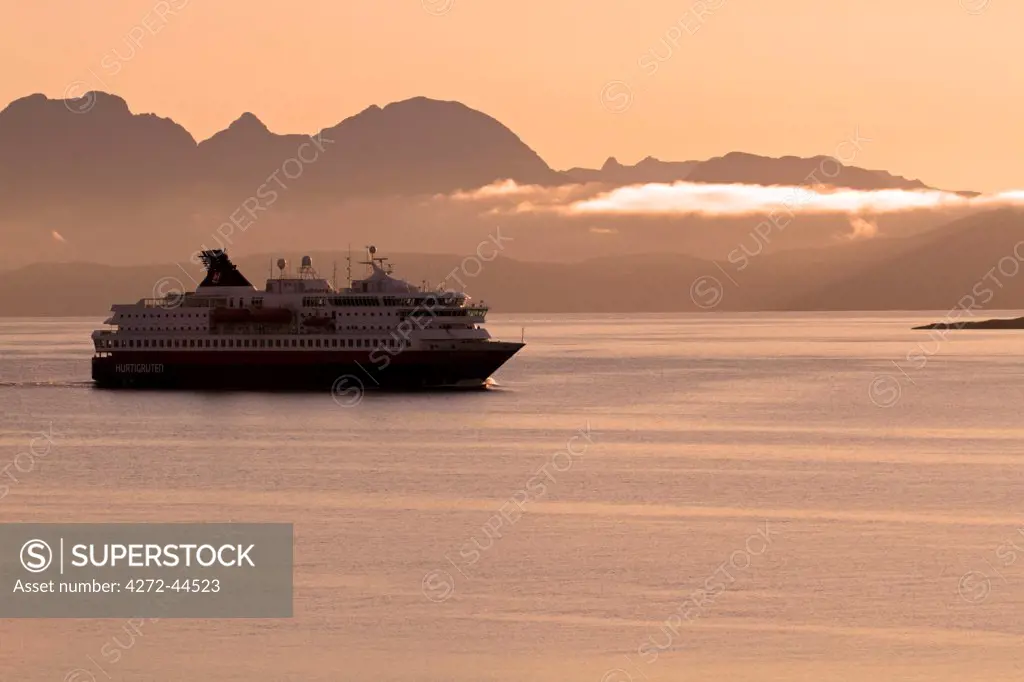 Hurtigruten ferry arriving at the port of Harstad on the island of Hinnoya in the Vesteralen Islands, Norway