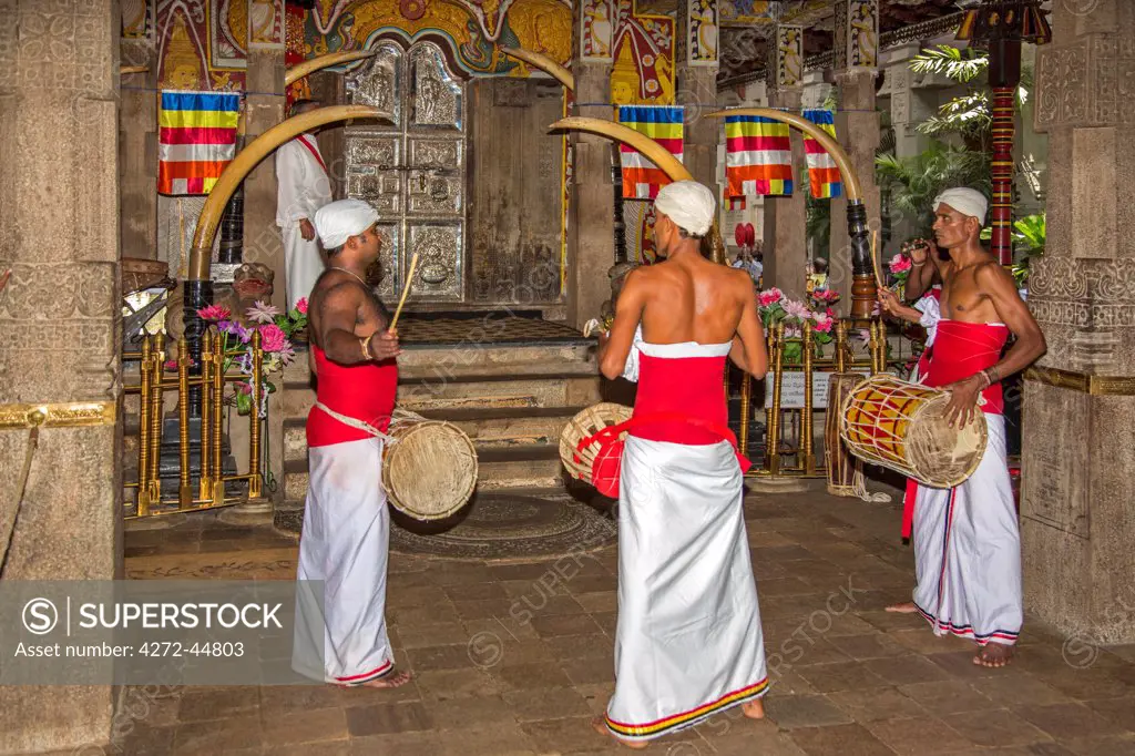 A ritual inside the Temple of the Sacred Tooth Relic is performed three times a day by monks. This temple houses the venerated tooth relic of Lord Buddha, Sri Lanka