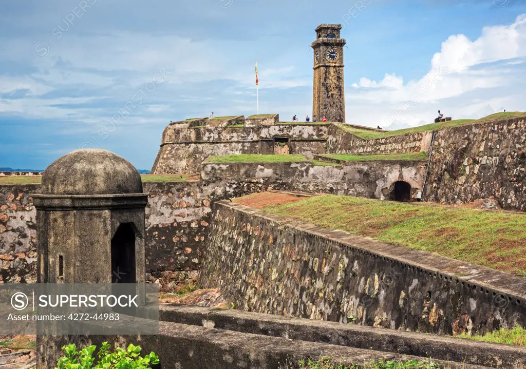 The British built clocktower and 17th century Dutch stone walls of Moon Bastion at Galle Fort, Sri Lanka