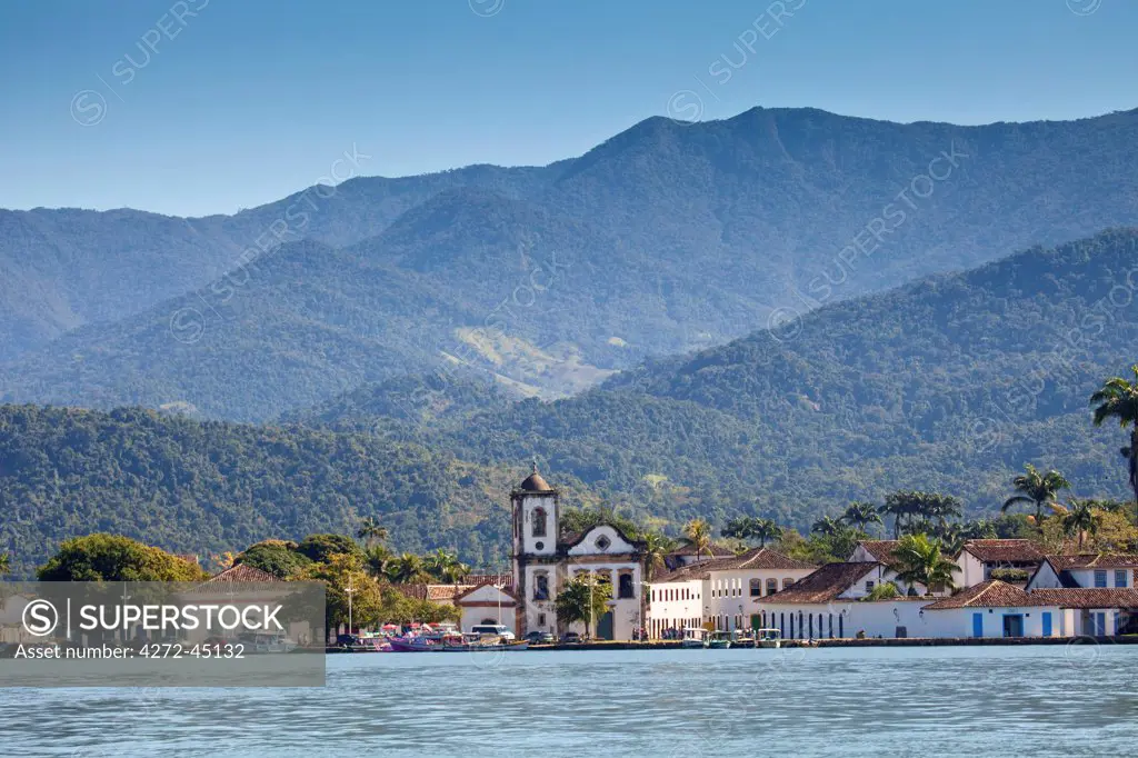Brazil, Parati, the Portuguese colonial town centre and the church of Saint Rita of Cascia seen from the water